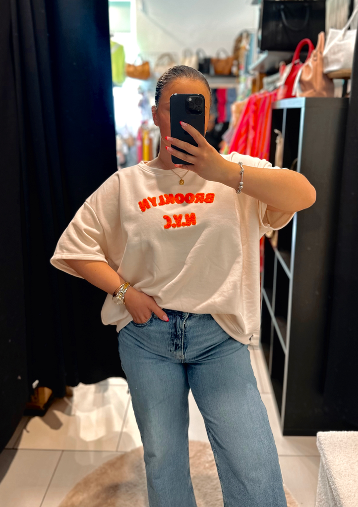 Pull N.Y.C beige et orange fluo