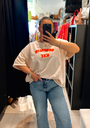 Pull N.Y.C beige et orange fluo