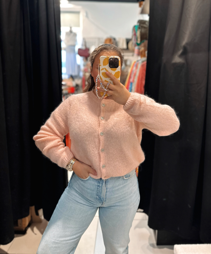 Gilet en laine rose pâle