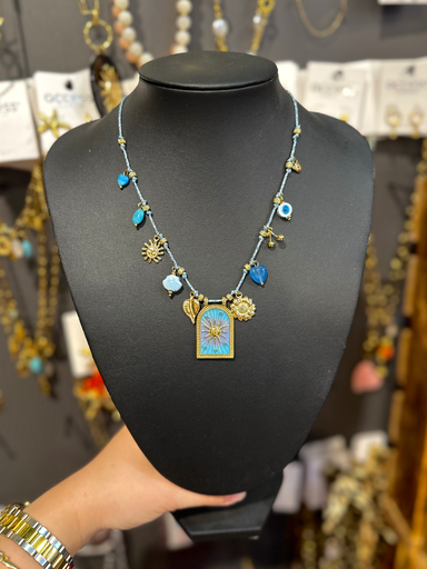 Collier cordon bleu et plaquette soleil 