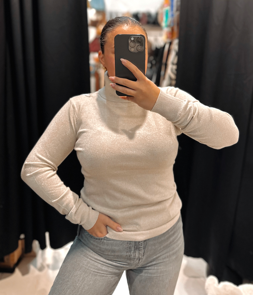 Col roulé paillettes crème 